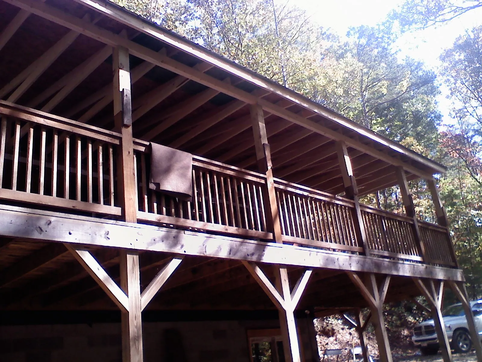 Timber framing under a new elevated porch and deck — Roof Leak Repair in Boone by Roofing Brothers